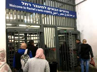 C:\Users\Ranjan\Desktop\Every weekday morning, thousands of Palestinian workers line up from early morning to cross through Checkpoint 300 (located in Israeli occupied territory in the West Bank), to travel to work in Jerusalem - 2.JPG